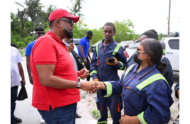President, Dr Mohamed Irfaan Ali interacts with a group of young trainees