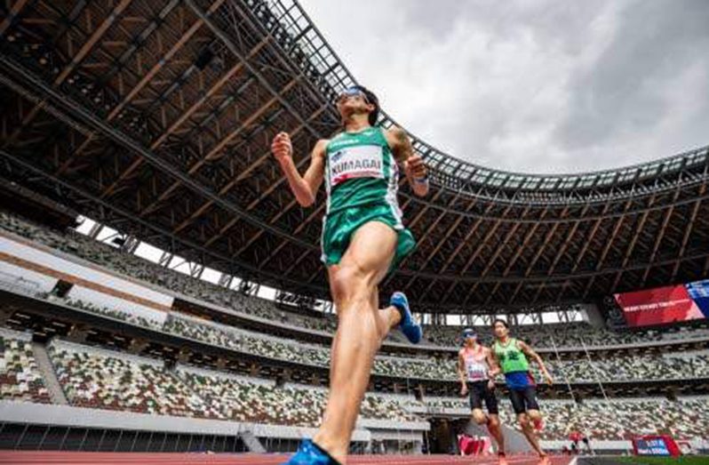 Yutaka Kumagai of Japan competes in the men's 5 000m - T12 category during a para-athletics test event for the 2020 Tokyo Olympics at the National Stadium in Tokyo on Tuesday. (Photo: AFP)