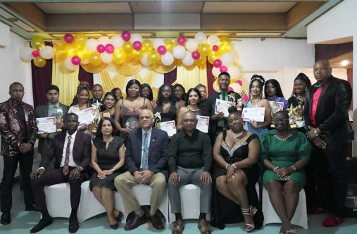 Deputy Commissioner ‘Administration’ of the Guyana Police Force, Mr. Ravindradat Budhram (third from right seated) next to senior officers and Dr. Jay Sobhraj, founder of the Zara Computer Centres and owner of the Jay & Sylvia Sobhraj Foundation (third from left seated) with other officials flanked by honorees and awardees of the GPF’s Zara Computer Centre Annual Dinner and Awards Ceremony held at Regency Suites, Georgetown