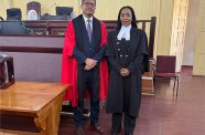 Attorney-at-Law Zola Williams alongside Justice Gino Persaud