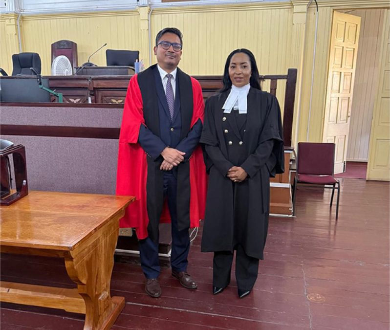 Attorney-at-Law Zola Williams alongside Justice Gino Persaud
