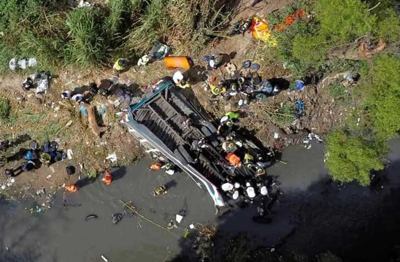 The bus fell on its roof, complicating the rescue efforts