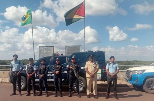 Officers at the Takatu International Bridge between Brazil and Guyana