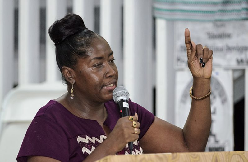 Minister Valerie Patterson-Yearwood addressing residents of Kitty at the community meeting held at the F.E. Pollard Primary School, David Street, on Friday