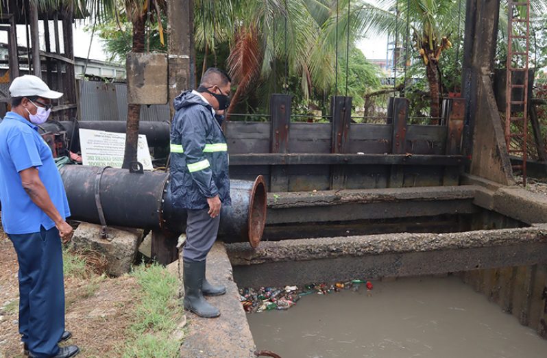 Agriculture Minister, Zulfikar Mustapha, during an assessment exercise of the pumps across Georgetown following flash flooding and high water levels on Wednesday