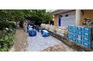Supplies are prepared for distribution following floods in northeastern Afghanistan (UNOCHA photo)