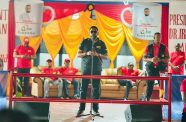 President Dr Mohamed Irfaan Ali addresses those present at the family fun day on Sunday (DPI)