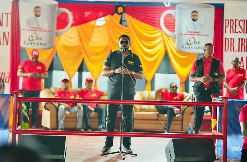 President Dr Mohamed Irfaan Ali addresses those present at the family fun day on Sunday (DPI)