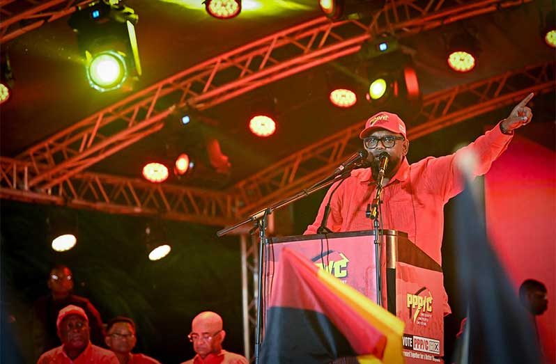 President Dr. Irfaan Ali speaking at the Stewartville rally on Sunday (DPI photo)