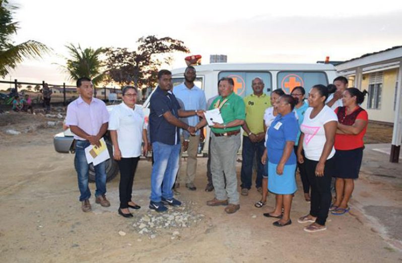 Minister of Indigenous Peoples’ Affairs, Sydney Allicock and Regional Executive Officer, Carl Parker during the handing over of the ambulance to the Aishalton District Hospital