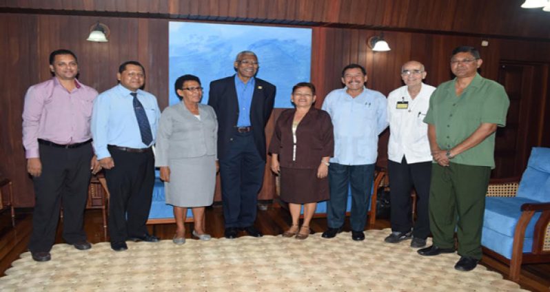 From left: Chief Executive Officer Neil Bacchus, David James, Doreen Jacobis, Patricia Singh, Minister Sydney Allicock, Father Malcolm Ferreira and Commissioner of the Guyana Forestry Commission, James Singh