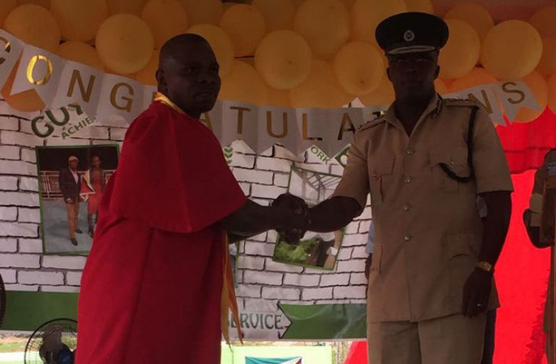 Andre Hetsberger back in 2017 graduated from a skill training course at the Mazaruni Prison. In this photo he is with Director of Prisons (ag) Gladwin Samuels.
