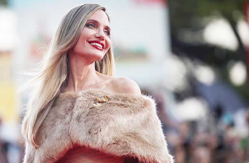 Actor Angelina Jolie poses on the red-carpet during arrivals for the screening of the movie "Maria", in competition, at the 81st Venice Film Festival, Venice, Italy, August 29, 2024 (REUTERS/Louisa Gouliamaki/File Photo)