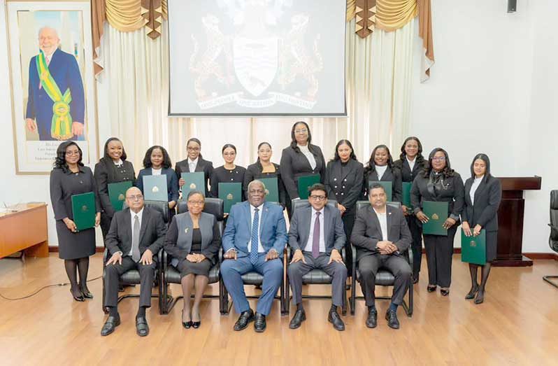 Five new Commissioners of Title and six new Magistrates were on Wednesday sworn in (Office of the Prime Minister photo)