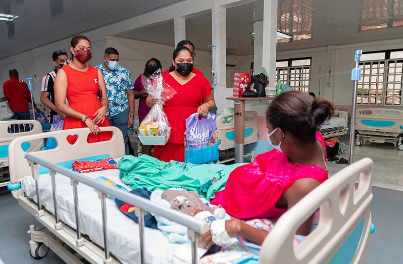 First Lady, Arya Ali, distributes hampers to the mothers at the GPHC maternity ward on Christmas Day