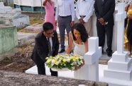 Senior Minister in the Office of the President with Responsibility for Finance and the Public Service, Dr Ashni Singh and President of the Queen’s College (QC) Old Students’ Association (QC-OSA), Pauline Chase, laying a wreath at the grave site of Lord Bishop William Piercy Austin, the school’s founder (MoF photo)