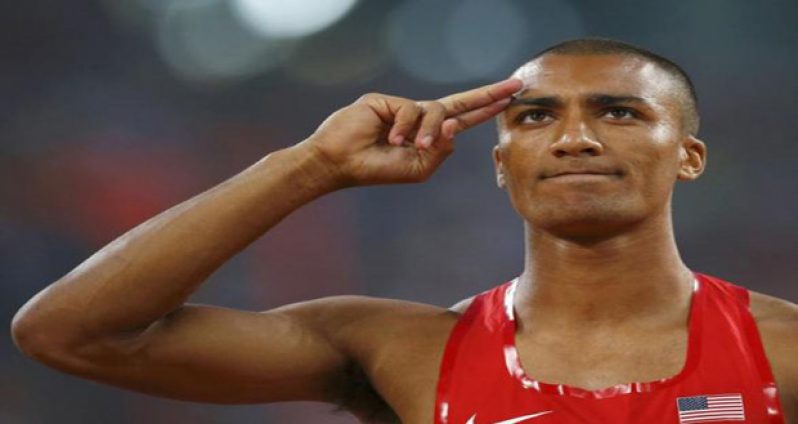 Ashton Eaton of the U.S. gestures as he competes in the javelin throw event of the men's decathlon during the 15th IAAF World Championships at the National Stadium in Beijing, China, yesterday. (Reuters/Kai Pfaffenbach)
