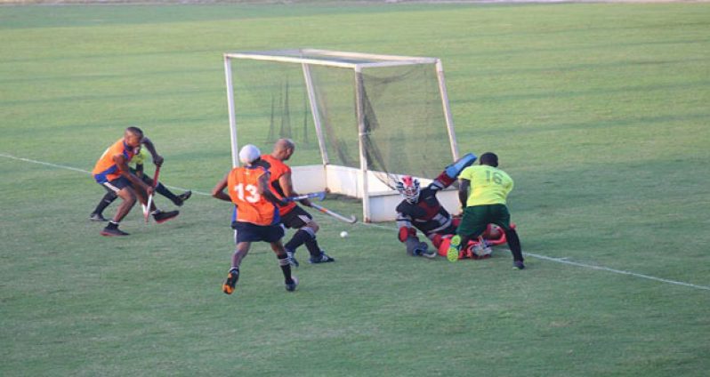 Hikers Jamarj Assanah feeds the ball to team mate Robert France (partly hidden) at right for the equaliser.