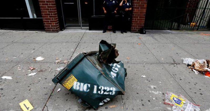 The mangled dumpster at the site of the explosion that rocked the New York's Chelsea neighborhood late on Saturday