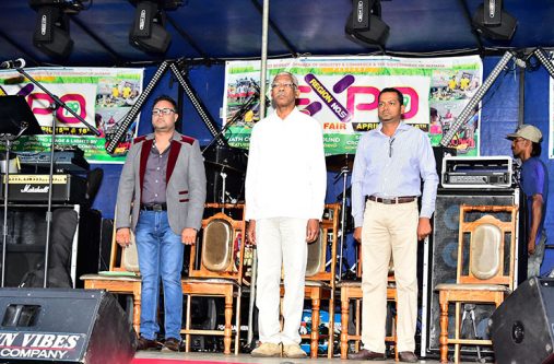 attention President David Granger makes a point to Regional Chairman Vickchand Ramphal during the opening ceremony of the Expo and Trade Fair at the Bath Settlement Community Ground, West Coast Berbice