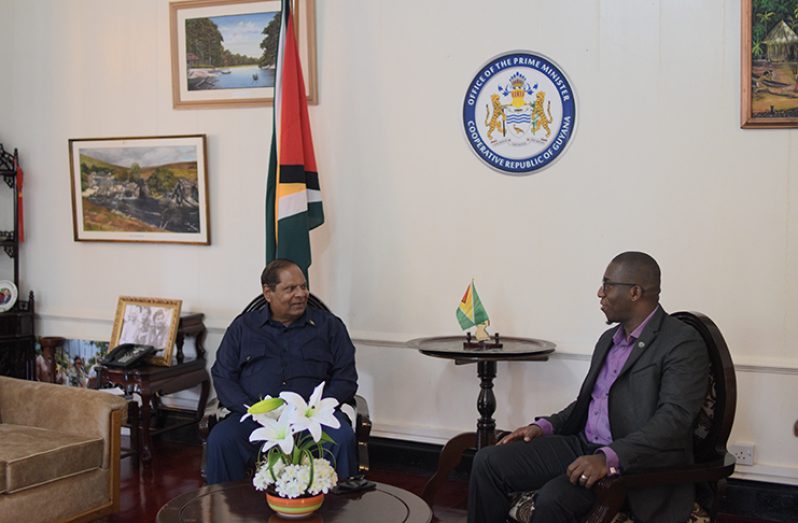 Prime Minister Moses Nagamootoo and Dr. Devon Bannister, Pro-Chancellor of the Canadian International Chaplaincy Association