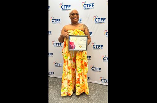 ‘Territory’ Director Jael Joseph poses with her award for Best Short Documentary.