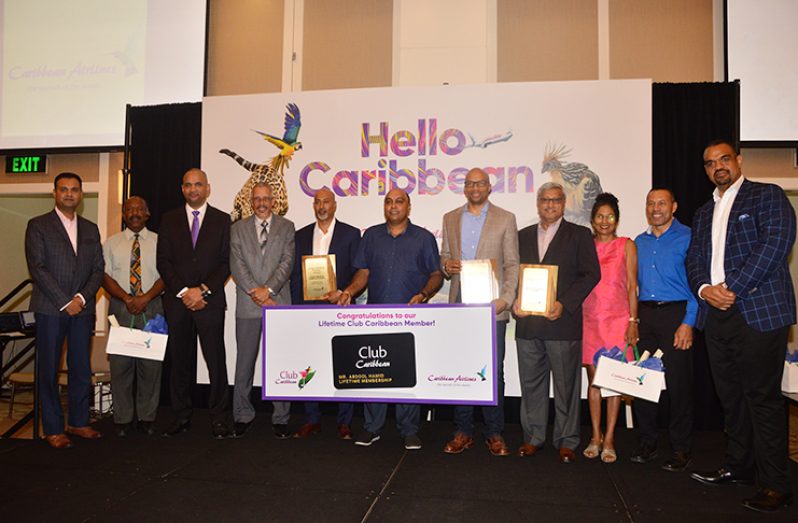 At (centre) is the Executive Gold Awardee Mr Abdool Hamid, along with other top awardees of GBTI, DDL, GT&T and CEO of Caribbean Airlines Garvin Medera
