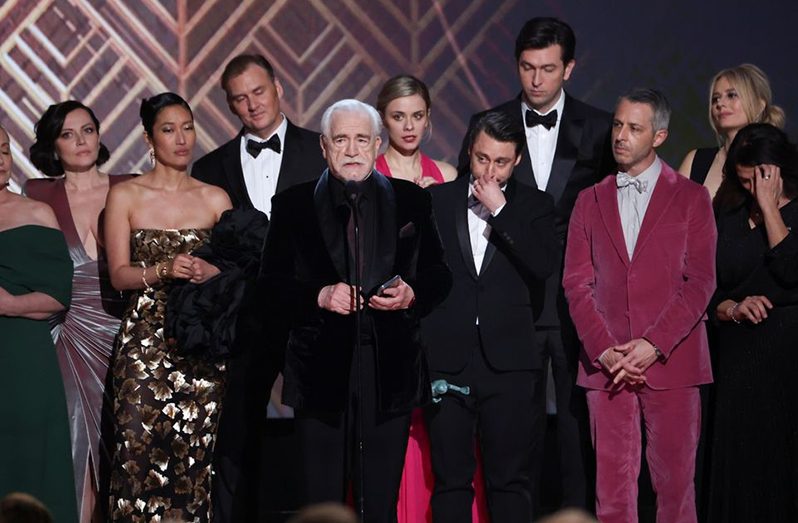 The cast of "Succession" receives the award for Outstanding Performance by Ensemble in a Drama Series at the 28th Screen Actors Guild Awards, in Santa Monica, California, on February 27, 2022 (REUTERS/Mario Anzuoni/File Photo)