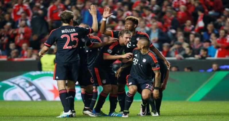 Bayern Munich's Arturo Vidal celebrates scoring their first goal. (Reuters/Paul HannaLivepic)
