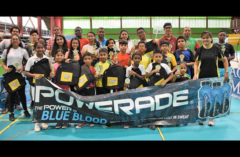 The winners show off their prizes.