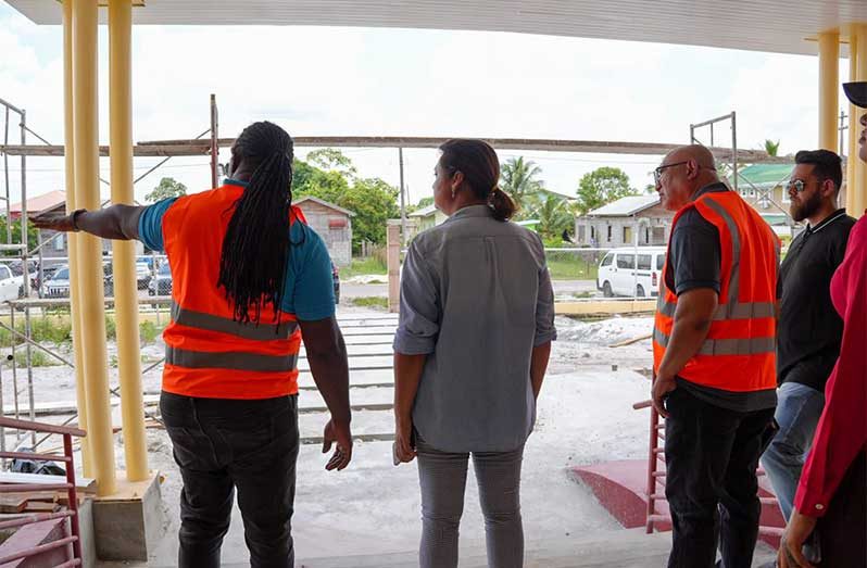 Minister of Local Government and Regional Development, Priya Manickchand, engages contractors at the site where the Bamia Primary School is being constructed. The project has seen numerous delays but Minister Manickchand is pushing for the timely completion of the project, so that approximately 800 pupils can be accommodated in a more comfortable learning environment (Photo: Priya Manickchand/ Facebook)