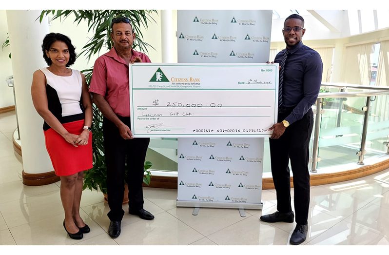 Citizens Bank Marketing Manager Mikhail J Mc Kenzie hands over the sponsorship cheque to LGC Captain Ayube Subhan in the presence of the Club’s President Anasha Ally