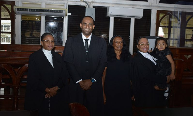 From left: Chief Justice (ag) Roxane George, newly-sworn attorney, Crime Chief Wendell Blanhum, his relative and his wife, attorney Latchmie Rahamat with their daughter (Elvin Carl Croker photo)
