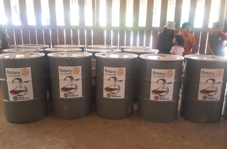 Some of the water barrels that were donated