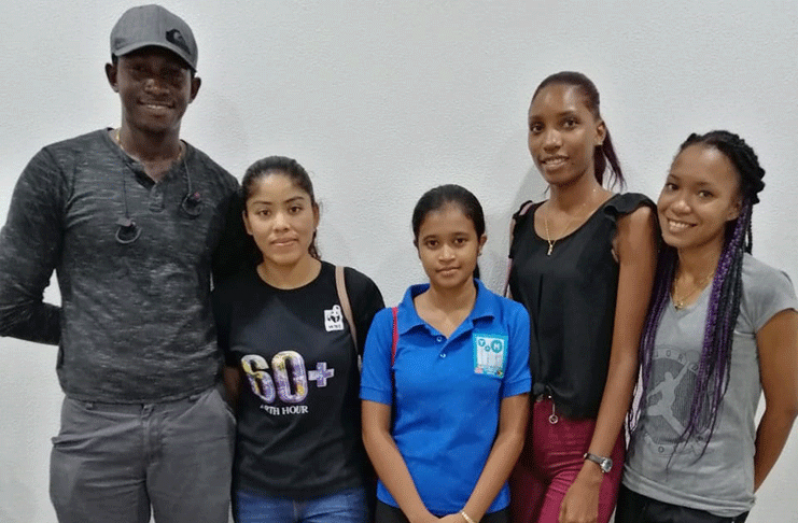 Guyana/Windies Performance Enhancement Specialist Neil Barry Jr. and a few of the students from the UG Physiotherapy Department who will be facilitating the bowling clinic