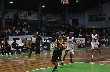 Jamaica’s Jalen Menzies goes for a layup.