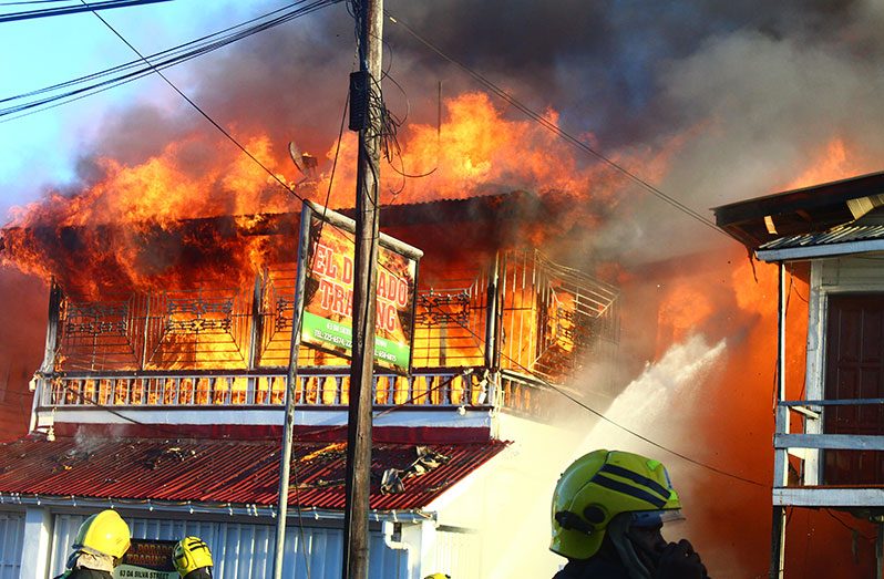 These Japheth Savory photos capture firefighting efforts and the raging fire