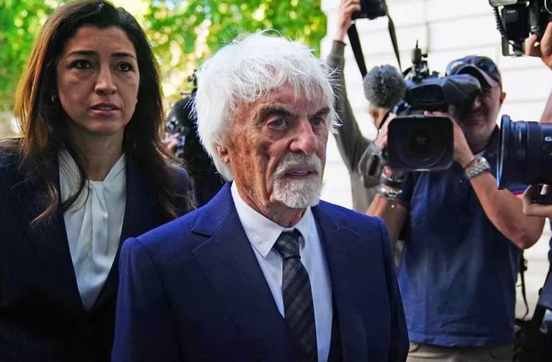 Bernie Ecclestone was met by photographers and camera crews as he entered court on Monday