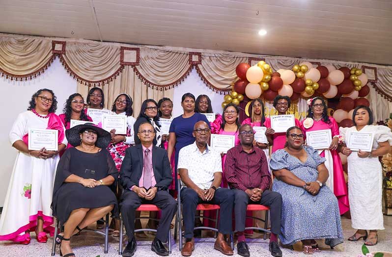 Seated from left: Dr Michelle Shiwnandan, Reverend Dr Ravindra Shiwandan, Minister of Labour Joseph Hamilton, CEO of BIT Richard Maughn and Technical Officer responsible for the East Bank district, Rima Rohee with some graduates of the programme (BIT Photo)