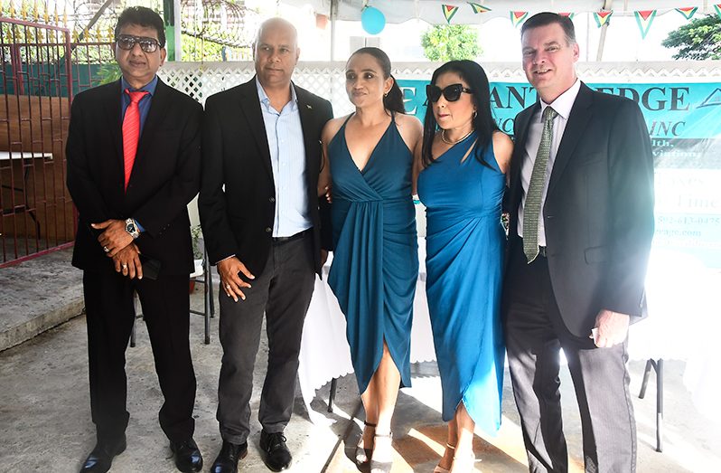 From the extreme right, Attorney General, Anil Nandlall; President of the Georgetown Chamber of Commerce & Industry, Timothy Tucker and the Board of Directors of Atlantic Edge Insurance Brokerage
