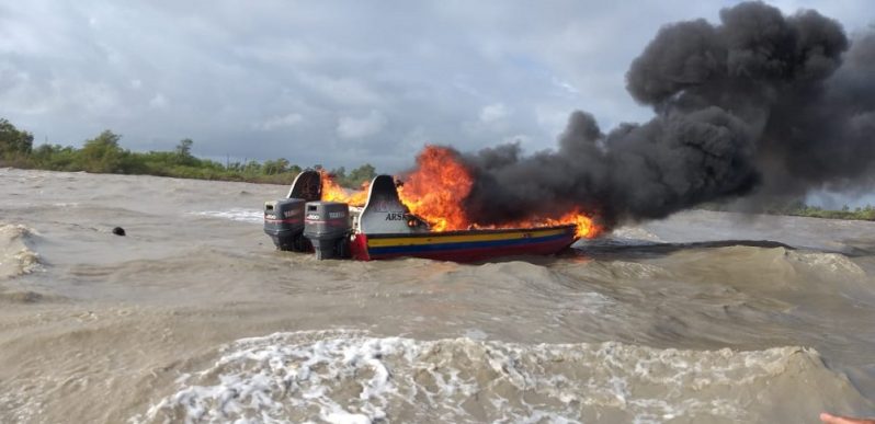 The boat on fire on Sunday morning.
