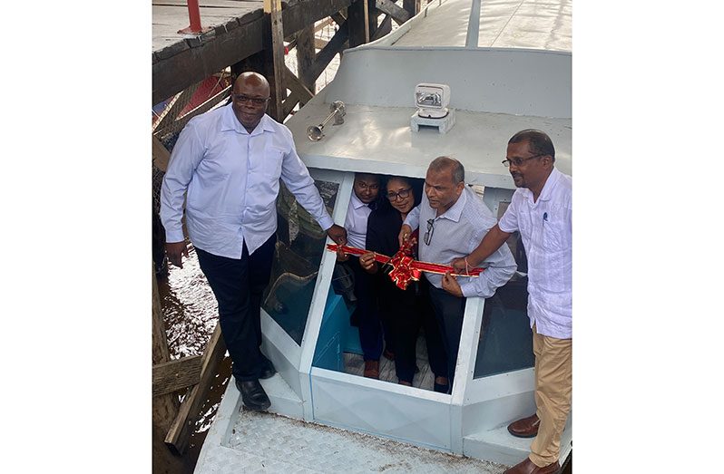 Minister of Health Dr Frank Anthony (second from left); Region Two Chairperson Vilma De Silva (centre) and other regional officials commissioning the boathouse and water ambulance at Supenaam