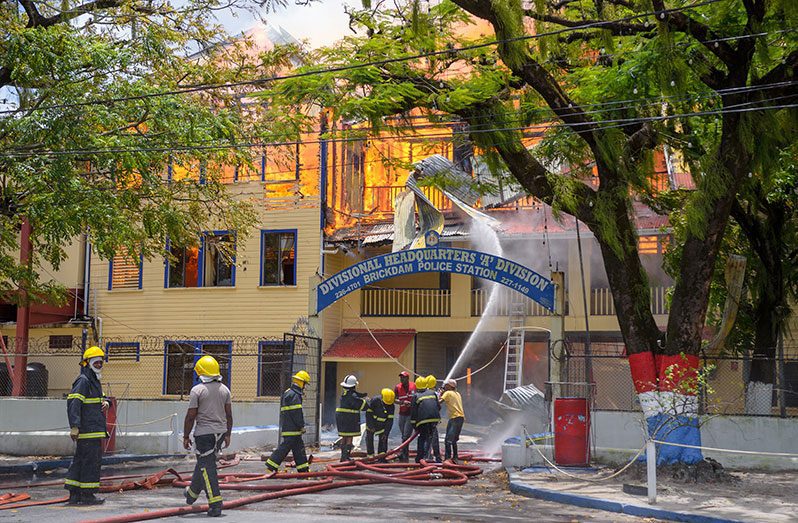 A section of the Brickdam Police Station engulfed in flames (Delano Williams photo)