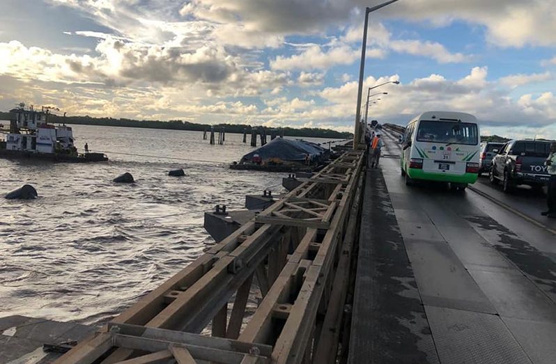 Scenes from Wednesday’s barge collision at the Demerara Harbour Bridge (taken from the Facebook page of Junior Public Works Minister, Deodat Indar