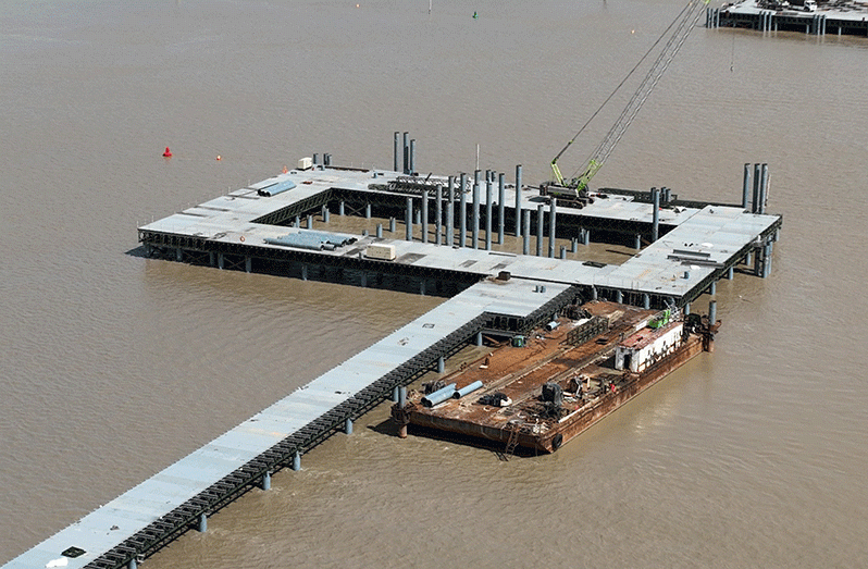 An aerial view of the temporary platform being built to support the new Demerara River crossing (Office of the President photos)
