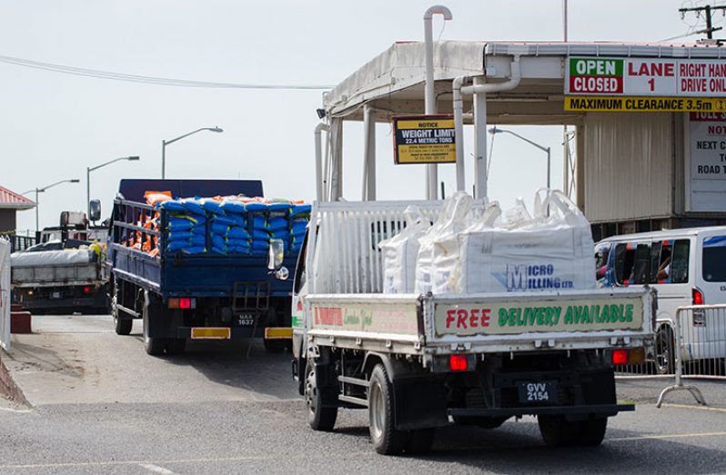Trucks being weighed before being given permission to cross the bridge (Delano Williams photo)