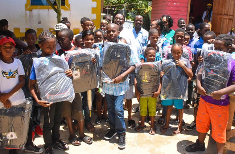 Minister within the Ministry of Natural Resources, Simona Broomes,  and the students