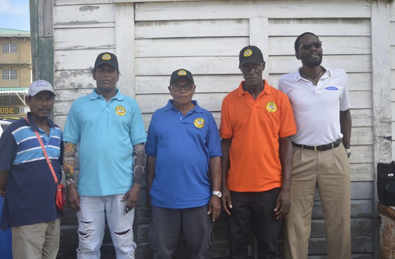 United Minibus Union President, Eon Andrews (right) met with some of Route 42 minibus drivers on Monday. From left are Quincy Welcome, Paul Leonard, Felix Walker and Leroy Johnson (Tamica Garnett photo)