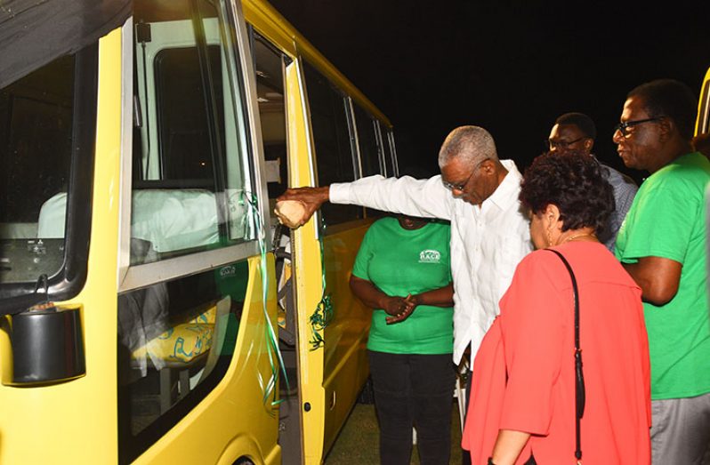 President Granger commissions one of the two buses that will be given to Region Four as part of his 5Bs initiative. Both buses were donated by overseas members of the People’s National Congress/ Reform (PNC/R) party residing in Miami, Florida. (Adrian Narine photo)