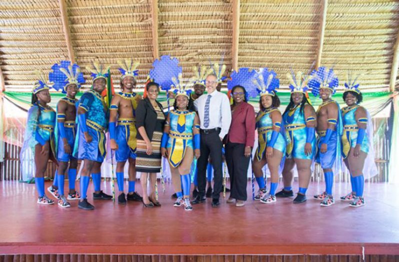 Minister of Business, Dominic Gaskin and his Permanent Secretary, Rajdai Jagarnauth with the revellers